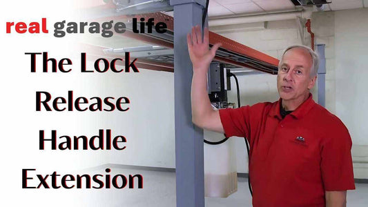 Man demonstrating Advantage Lock Release handle extension for garage lifts