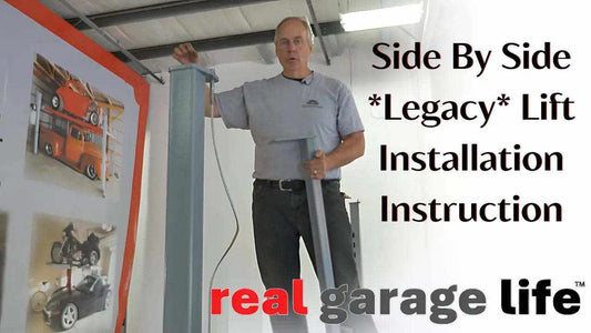 Man demonstrating side-by-side 10,000-pound two-car lift installation in a garage with instructional text on wall