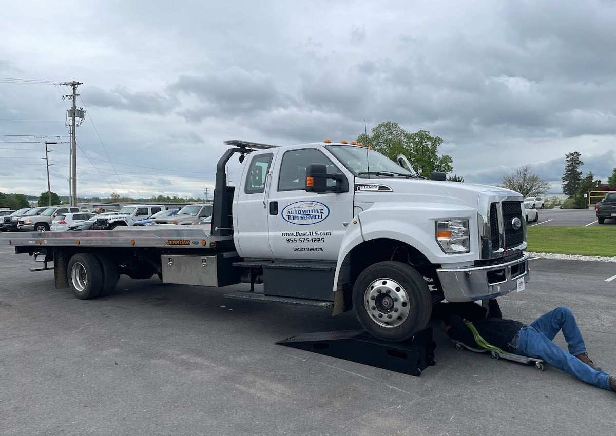 Heavy-Duty Truck Ramps with a large rollback truck on them