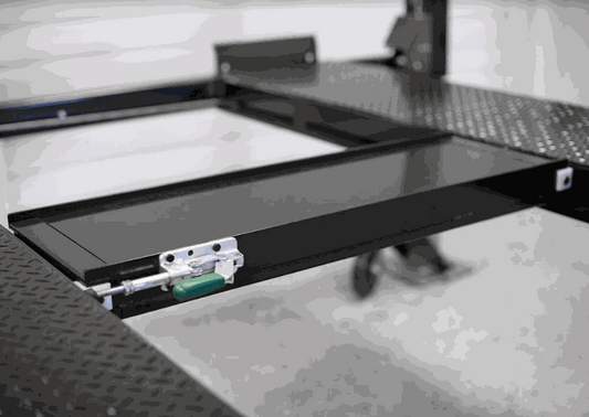 Rolling Jack Platform for raising vehicle wheels during tire rotation and brake work